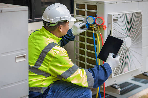 Professional Air Conditioning Repair technician working in South Carver, MA